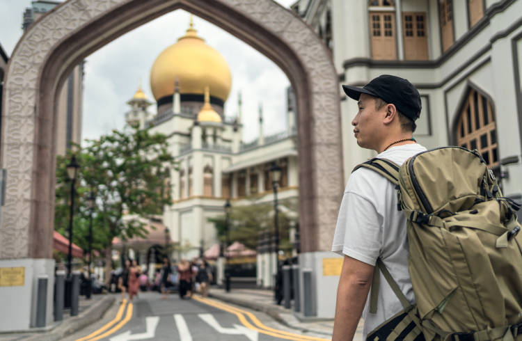 ourist in front of the Sultan Mosque in Singapore